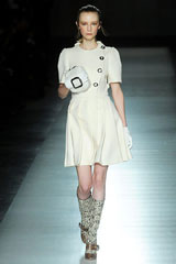 Creme Prada dress & stylish handbag